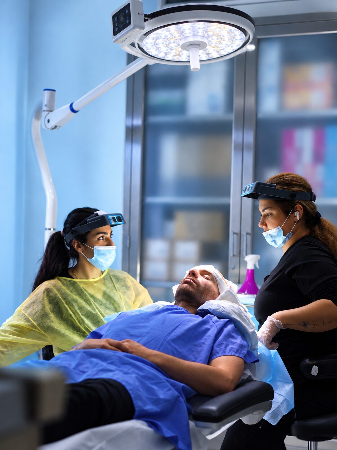 Nova Medical team member using magnifying loupes during a hair restoration procedure in Nashville, Tennessee